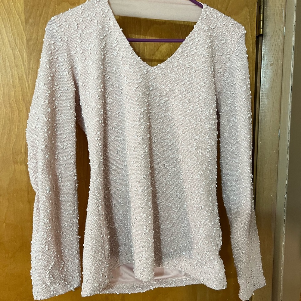 Jennifer Lopez, pink sparkly sweater